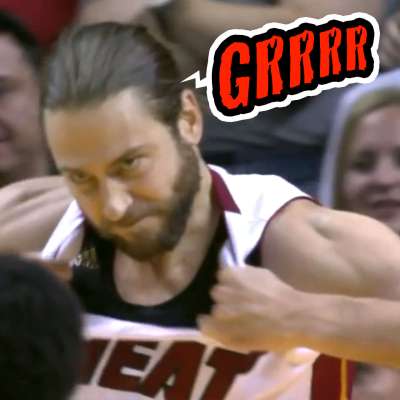 Miami Heat power forward Josh McRoberts tears his jersey
