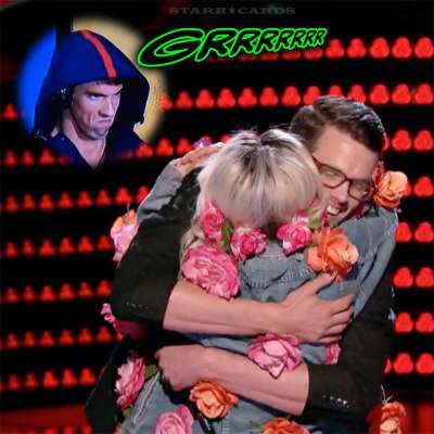 Phantom menace Michael Phelps growls as Miley Cyrus hugs Dave Moisan on 'The Voice'