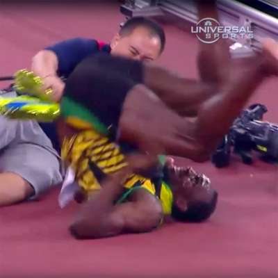 Usain Bolt taken out by cameraman's Segway