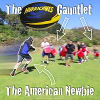 Elton Castee of TFIL runs the gauntlet formed by Wellington Hurricanes rugby players
