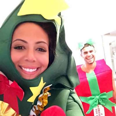 Sydney Leroux dresses up as a Christmas tree