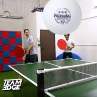 Team Edge's J-Fred and Marlin Ramsey Chan form a doubles team in giant table tennis