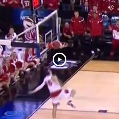 Wisconsin Badgers small forward Sam Dekker puts ball through hoop twice on dunk